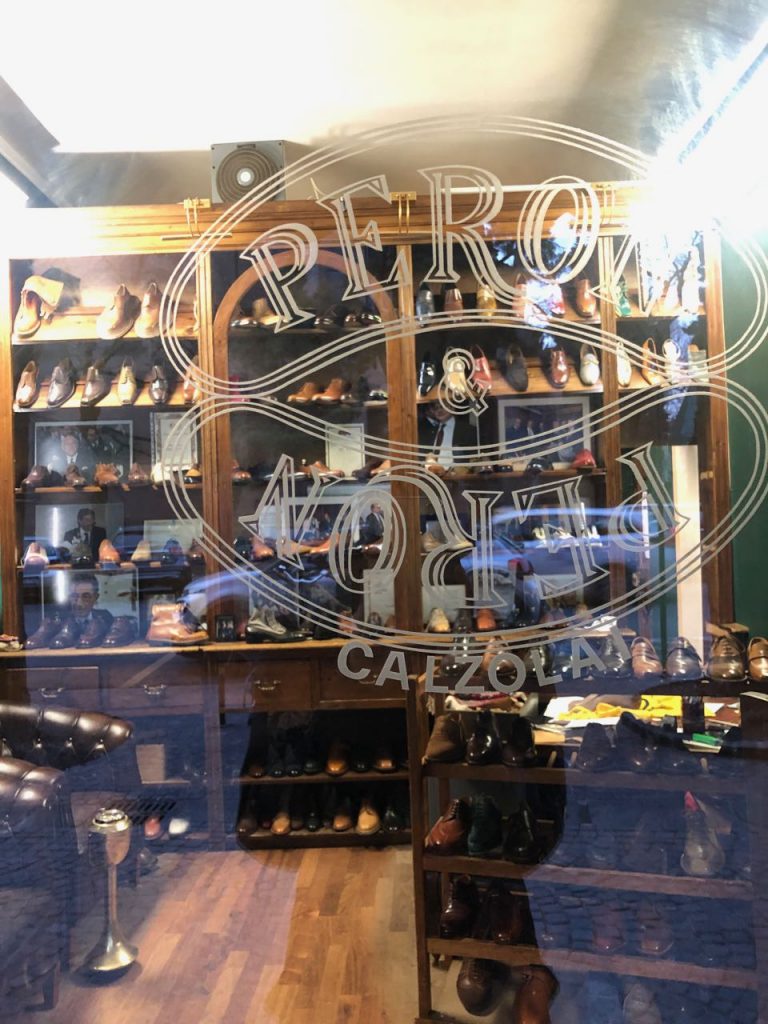 Peeking through the front window of Peron & Peron. Photo credit: Juhn Maing